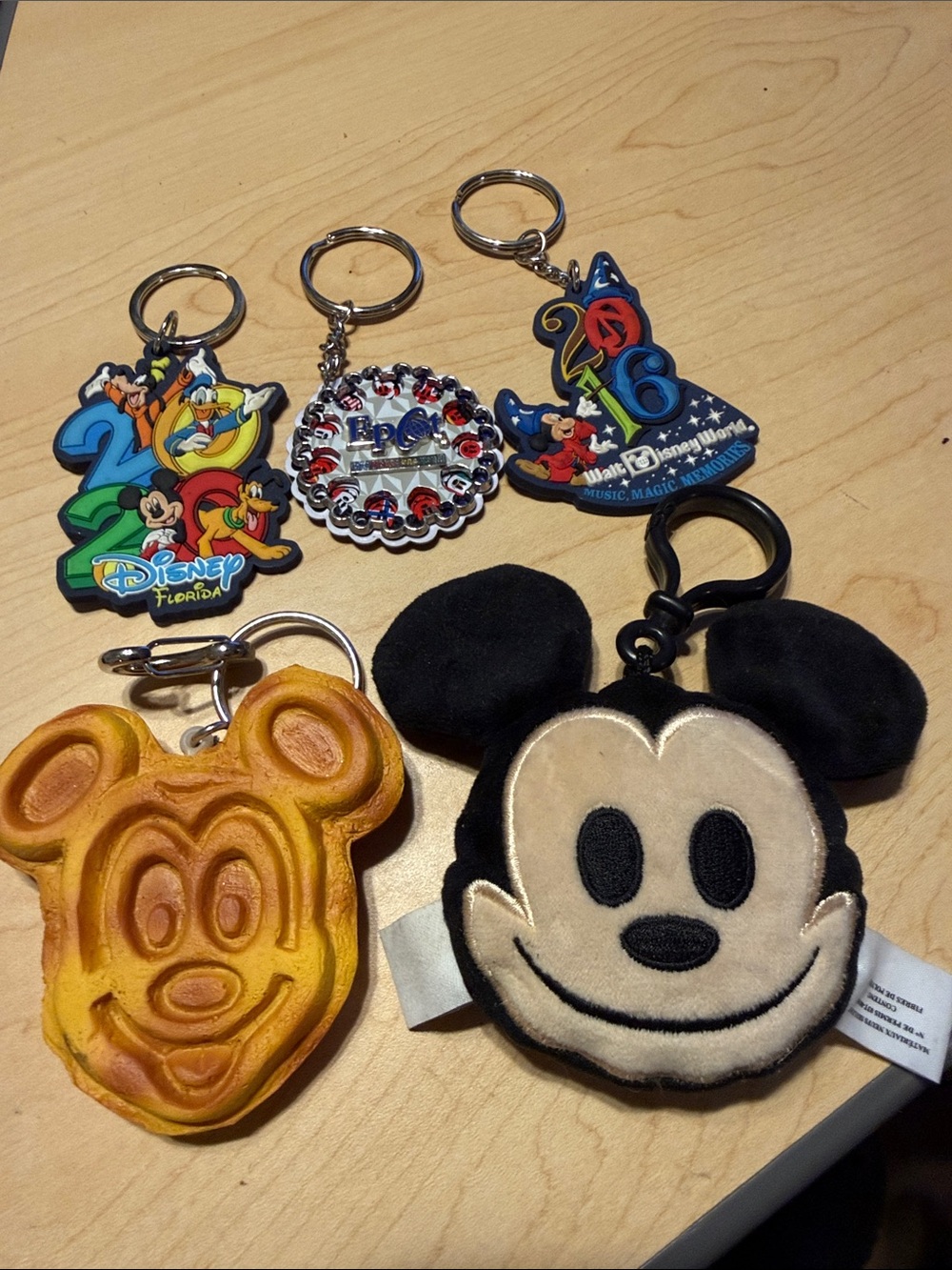 5 Disney Keychain collectibles  Lot with Blue, Yellow, Black and Red Accents.
